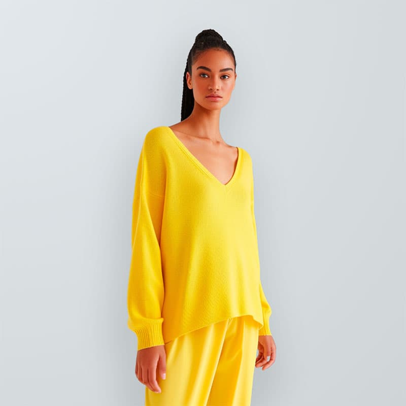 Woman in yellow sweater